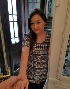 18 year old female Doris G slips off her underwear to pose naked on her bed